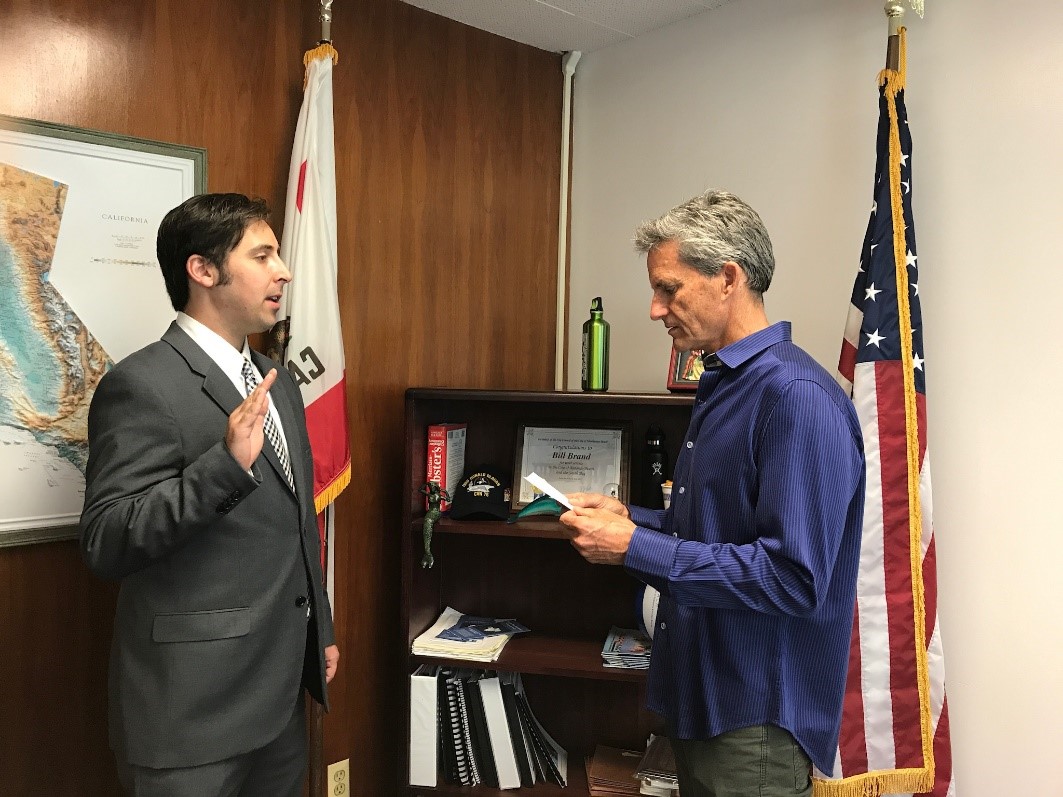 Ellis Raskin being sworn in by Redondo Beach Mayor Bill Brand